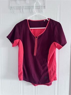 Pearl Izumi Women's Burgundy and Pink Short Sleeve Zip Cycling Top. Small marks